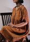 बंधनी रस्ट कफ्तान ड्रेस